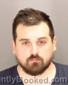 Mugshot of Daniel Blake Melton booked in Oakland County, Michigan on August 26, 2026