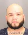 Mugshot of Juan Ivan Martinez booked in Oakland County, Michigan on August 26, 2026