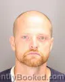 Mugshot of Quinten Ross Miller booked in Oakland County, Michigan on August 26, 2026
