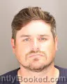 Mugshot of Jess Thomas Wilk booked in Oakland County, Michigan on August 27, 2026