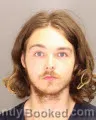 Mugshot of Ross Michael Tomasovich booked in Oakland County, Michigan on August 27, 2026