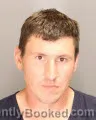 Mugshot of Vladyslav Renhach booked in Oakland County, Michigan on August 28, 2026