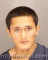 Mugshot of Christian Ariel Pavon-Reyes booked in Oakland County, Michigan on August 30, 2026