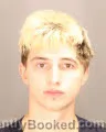 Mugshot of Jakub Nikolas Huffman booked in Oakland County, Michigan on September 1, 2026