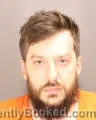 Mugshot of Andrew Patrick Janos booked in Oakland County, Michigan on September 1, 2026