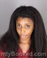 Mugshot of Reginelle Dzoe Johnson booked in Oakland County, Michigan on September 2, 2026