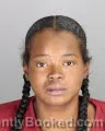 Mugshot of Ericka Nija Lively booked in Oakland County, Michigan on September 8, 2026