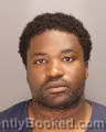 Mugshot of Bryan Yonn Jeuwou booked in Oakland County, Michigan on September 9, 2026