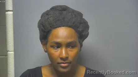Mugshot of KEYMIRA DAVNISE DAVENPORT booked in Saginaw County, Michigan on April 30, 2026