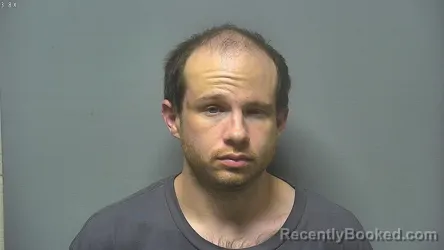 Mugshot of Austin Michael Gibson booked in Saginaw County, Michigan on October 7, 2026