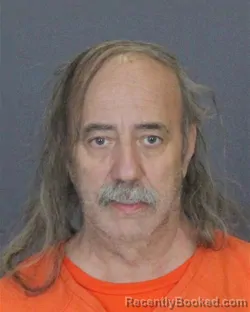 Mugshot of JOHN CLIFFORD REMICK booked in St Clair County, Michigan on May 8, 2026