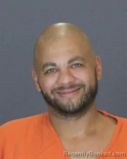Mugshot of Darnell James Evans booked in St Clair County, Michigan on August 13, 2026