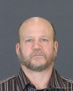 Booking photo from St Clair County, Michigan