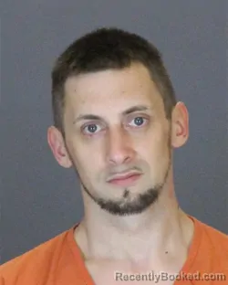 Mugshot of AUSTIN LEE-JOSEPH BURBY booked in St Clair County, Michigan on July 6, 2026
