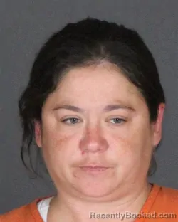 Mugshot of Julia Rebecca Couturier booked in St Clair County, Michigan on October 10, 2026
