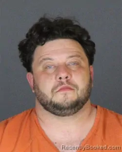 Mugshot of DANIEL EVAN RUTKOWSKI booked in St Clair County, Michigan on May 9, 2026