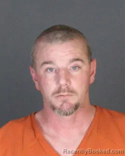 Booking photo from St Clair County, Michigan