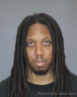 Mugshot of CHRISTIAN JACOB-RASHID LAWRENCE