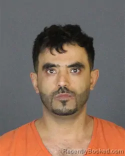 Mugshot of RAFAAT SHAKER MOHAMED KASSEM booked in St Clair County, Michigan on April 30, 2026