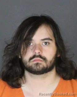 Mugshot of JUSTIN TROY DELEON booked in St Clair County, Michigan on May 9, 2026