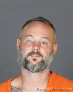 Mugshot of Brandon Stephen Ostipow booked in St Clair County, Michigan on July 29, 2026