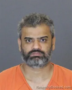 Mugshot of Krishna Guguloth booked in St Clair County, Michigan on August 6, 2026
