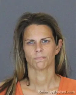Mugshot of Nicole Lynn Sinistaj booked in St Clair County, Michigan on August 14, 2026
