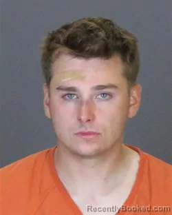 Mugshot of Logan Reins Revitzer booked in St Clair County, Michigan on September 13, 2026