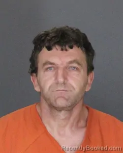 Mugshot of Nike Shkambi booked in St Clair County, Michigan on October 22, 2026
