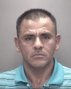 Mugshot of Mario Abad Olguin booked in Robeson County, North Carolina on October 19, 2026