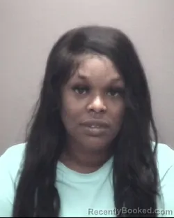 Mugshot of JASMINE LATASHA MCRAE booked in Robeson County, North Carolina on April 22, 2026