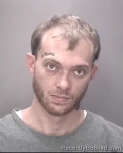 Mugshot of DANIEL TATUM