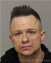 Mugshot of DANIEL KAJIKA JAMES HARVEY