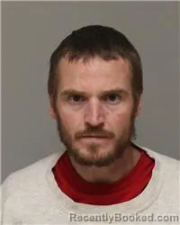 Mugshot of AARON MATTHEW THOMAS