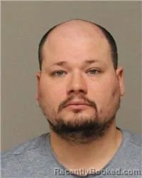 Mugshot of JORDAN TODD SYMANIETZ