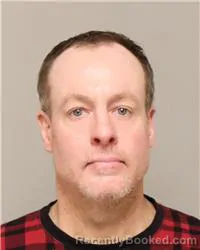 Mugshot of RAYMOND JAMES PATRAW booked in Anoka County, Minnesota on March 13, 2026