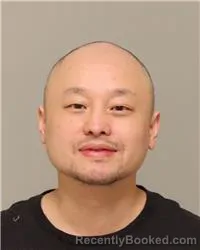 Mugshot of KONG CHUE VANG booked in Anoka County, Minnesota on March 13, 2026