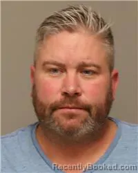 Mugshot of JUSTIN ROBERT ROONEY booked in Anoka County, Minnesota on March 14, 2026