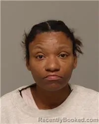 Mugshot of CARMALITHA FURTIMA MOORE booked in Anoka County, Minnesota on March 18, 2026