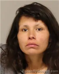 Mugshot of ROSALEE MARIE WEISS booked in Anoka County, Minnesota on March 20, 2026