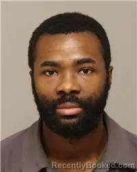 Mugshot of JOHN JOEJOE KORMAH booked in Anoka County, Minnesota on March 20, 2026