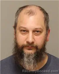 Mugshot of DAVID LEE DWELLY booked in Anoka County, Minnesota on March 20, 2026