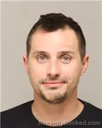 Mugshot of CHARLES BENJAMIN SCOTT RIGGS booked in Anoka County, Minnesota on March 21, 2026