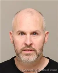 Mugshot of JOHN HENRY BUSSIE booked in Anoka County, Minnesota on March 23, 2026