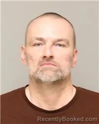 Mugshot of RAYMOND KINGSTON JOHNSON booked in Anoka County, Minnesota on March 23, 2026