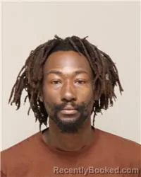 Mugshot of RYAN NYAMBUTI SIOCHA booked in Anoka County, Minnesota on March 23, 2026