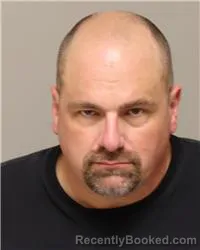 Mugshot of MICHAEL THOMAS AMES booked in Anoka County, Minnesota on March 26, 2026