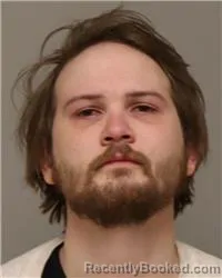 Mugshot of JUSTIN BRADLEY ULNESS booked in Anoka County, Minnesota on March 28, 2026