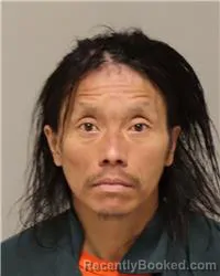 Mugshot of KOU HER booked in Anoka County, Minnesota on March 31, 2026