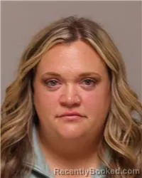 Mugshot of ALISHA MAE AIMUTIS booked in Anoka County, Minnesota on March 31, 2026